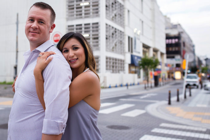 couple hugging in downtown